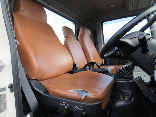 ヒノレンジャー 　上物新明和製回転板式パッカー車　容積６．４立米　汚水タンク付き　スペア吊り欠　連続切り替えスイッチ付き　緊急停止ボタン及び緊急停止スイッチ付き　オートマ　床後方鉄板２重張り（38枚目）