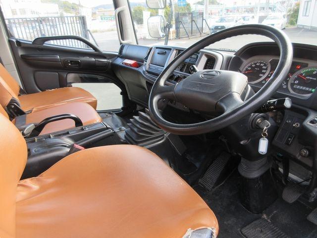 ヒノレンジャー 　上物新明和製回転板式パッカー車　容積６．４立米　汚水タンク付き　スペア吊り欠　連続切り替えスイッチ付き　緊急停止ボタン及び緊急停止スイッチ付き　オートマ　床後方鉄板２重張り（39枚目）