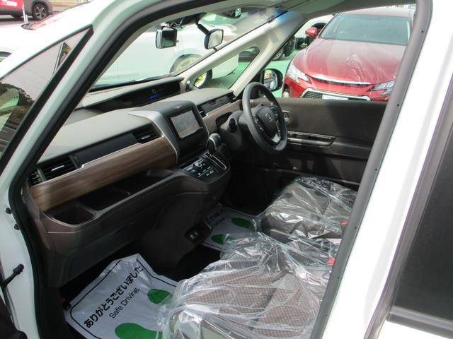 フリード Ｇ・ホンダセンシング／禁煙車　車検２年付き／ＬＥＤライト／６人乗り／純正ナビ／両側電動スライドドア／バックカメラ／ＥＴＣ／ドラレコ／衝突軽減装置／レーダークルーズ／Ｂｌｕｅｔｏｏｔｈ／スマートキー／（18枚目）