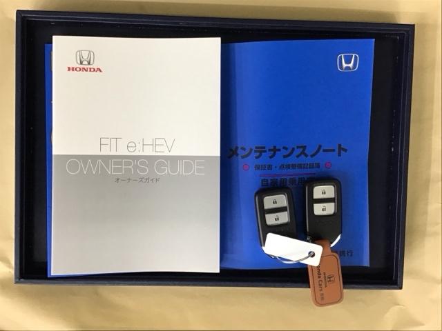 フィット ｅ：ＨＥＶホーム　ドラレコ　ナビ　Ｒカメラ　ブルートゥース　コーナーソナー　記録簿　サイドカーテンエアバック　Ｂカメ　ＷＳＲＳ　スマートキープッシュスタート　フルオートエアコン　地デジ　盗難防止システム　Ｉストップ（31枚目）