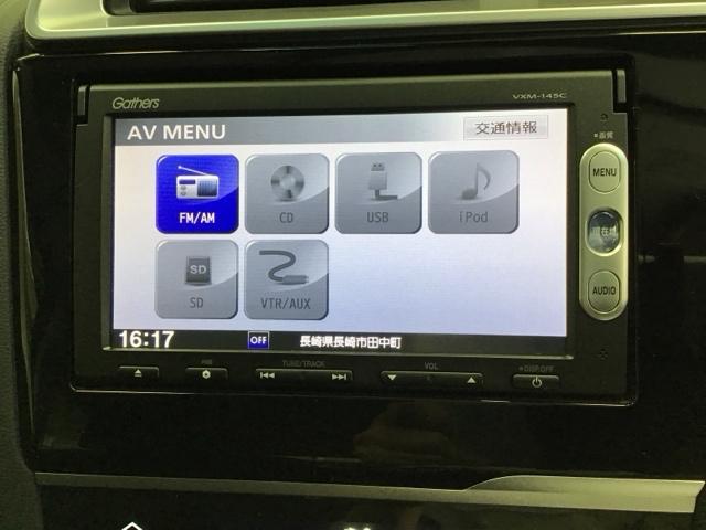 フィットハイブリッド Ｆパッケージ　ナビ　Ｒカメラ　ＥＴＣ　ＣＤ　アイドリングストップ機能　スマートキ　記録簿　イモビ　リヤカメラ　運転席エアバック　ＡＡＣ　助手席エアバック　横滑防止装置　キーレスエントリー　ＡＢＳ付　パワーウィンドウ（11枚目）