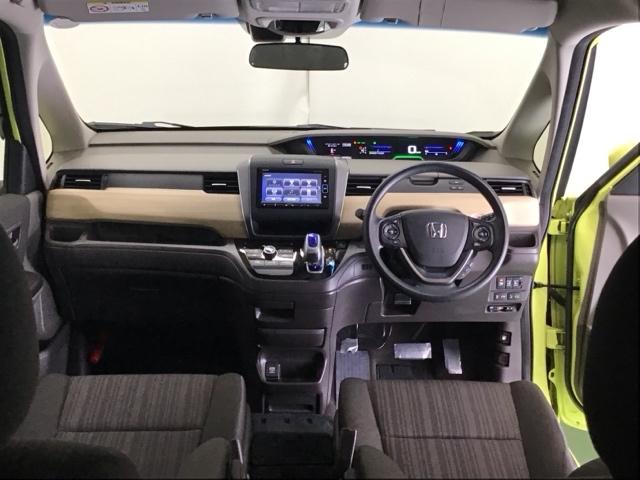 フリードハイブリッド ハイブリッド・Ｇホンダセンシング　ナビ　Ｒカメラ　ブルートゥース　フルセグ　両電動ドア　サポカー　両席エアバック　記録簿付　地デジＴＶ　リアカメラ　横滑防止　オートクルーズコントロール　エアバック　スマートキープッシュスタート　ＵＳＢ（2枚目）