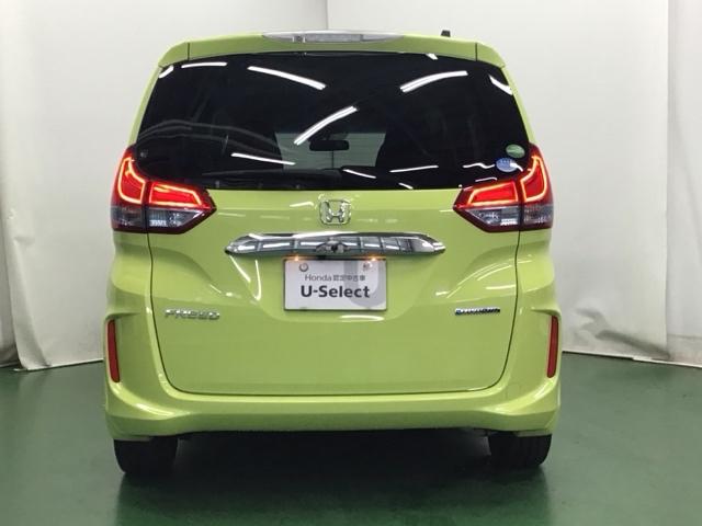 フリードハイブリッド ハイブリッド・Ｇホンダセンシング　ナビ　Ｒカメラ　ブルートゥース　フルセグ　両電動ドア　サポカー　両席エアバック　記録簿付　地デジＴＶ　リアカメラ　横滑防止　オートクルーズコントロール　エアバック　スマートキープッシュスタート　ＵＳＢ（9枚目）