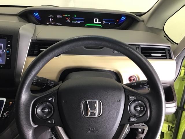 フリードハイブリッド ハイブリッド・Ｇホンダセンシング　ナビ　Ｒカメラ　ブルートゥース　フルセグ　両電動ドア　サポカー　両席エアバック　記録簿付　地デジＴＶ　リアカメラ　横滑防止　オートクルーズコントロール　エアバック　スマートキープッシュスタート　ＵＳＢ（20枚目）