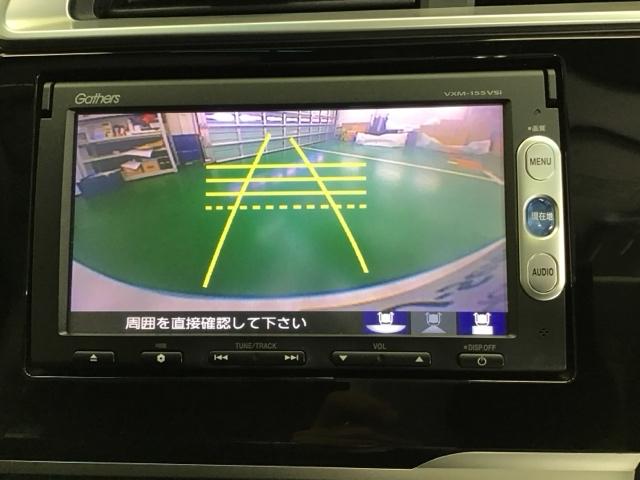 フィットハイブリッド Ｆパッケージ　ドラレコ　ナビ　Ｒカメラ　ブルートゥース　エコモード　整備記録簿　ワンセグテレビ　スマートキ－　イモビ　リヤカメラ　ＤＶＤ視聴　横滑防止　ＡＡＣ　運転席エアバック　キーレスエントリー　ＡＢＳ（12枚目）