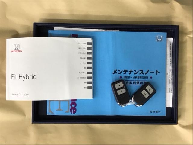 フィットハイブリッド Ｆパッケージ　ドラレコ　ナビ　Ｒカメラ　ブルートゥース　エコモード　整備記録簿　ワンセグテレビ　スマートキ－　イモビ　リヤカメラ　ＤＶＤ視聴　横滑防止　ＡＡＣ　運転席エアバック　キーレスエントリー　ＡＢＳ（26枚目）