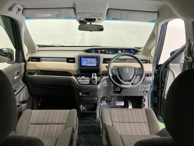 フリードハイブリッド ハイブリッド・Ｇホンダセンシング　ナビ　Ｒカメラ　ブルートゥース　フルセグ　軽減ブレーキ　キーフリーシステム　記録簿　ＤＶＤ再生可能　ＥＣＯＮ　後カメラ　Ａクルーズ　ＬＥＤヘッドランプ　横滑防止　パワーウインドウ　３列シート　ＥＴＣ付（2枚目）
