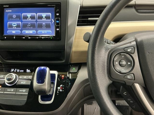 フリードハイブリッド ハイブリッド・Ｇホンダセンシング　ナビ　Ｒカメラ　ブルートゥース　フルセグ　軽減ブレーキ　キーフリーシステム　記録簿　ＤＶＤ再生可能　ＥＣＯＮ　後カメラ　Ａクルーズ　ＬＥＤヘッドランプ　横滑防止　パワーウインドウ　３列シート　ＥＴＣ付（3枚目）