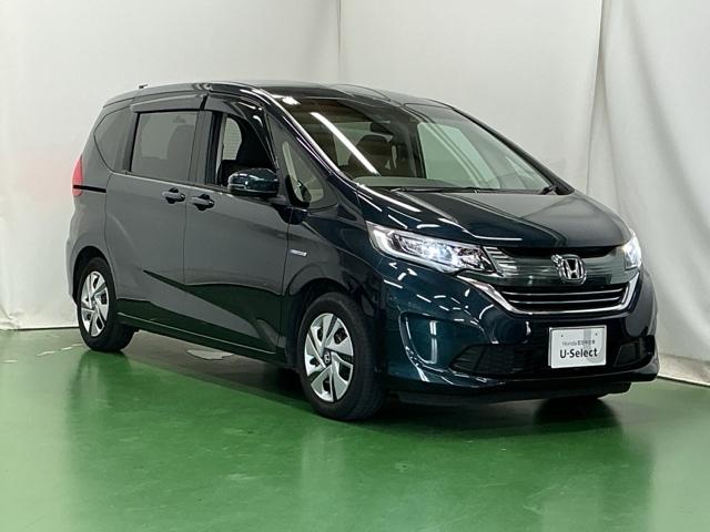 フリードハイブリッド ハイブリッド・Ｇホンダセンシング　ナビ　Ｒカメラ　ブルートゥース　フルセグ　軽減ブレーキ　キーフリーシステム　記録簿　ＤＶＤ再生可能　ＥＣＯＮ　後カメラ　Ａクルーズ　ＬＥＤヘッドランプ　横滑防止　パワーウインドウ　３列シート　ＥＴＣ付（7枚目）