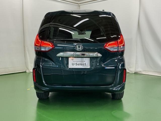 フリードハイブリッド ハイブリッド・Ｇホンダセンシング　ナビ　Ｒカメラ　ブルートゥース　フルセグ　軽減ブレーキ　キーフリーシステム　記録簿　ＤＶＤ再生可能　ＥＣＯＮ　後カメラ　Ａクルーズ　ＬＥＤヘッドランプ　横滑防止　パワーウインドウ　３列シート　ＥＴＣ付（9枚目）