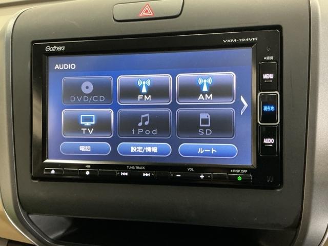 フリードハイブリッド ハイブリッド・Ｇホンダセンシング　ナビ　Ｒカメラ　ブルートゥース　フルセグ　軽減ブレーキ　キーフリーシステム　記録簿　ＤＶＤ再生可能　ＥＣＯＮ　後カメラ　Ａクルーズ　ＬＥＤヘッドランプ　横滑防止　パワーウインドウ　３列シート　ＥＴＣ付（11枚目）