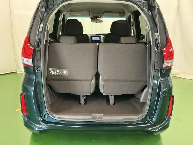 フリードハイブリッド ハイブリッド・Ｇホンダセンシング　ナビ　Ｒカメラ　ブルートゥース　フルセグ　軽減ブレーキ　キーフリーシステム　記録簿　ＤＶＤ再生可能　ＥＣＯＮ　後カメラ　Ａクルーズ　ＬＥＤヘッドランプ　横滑防止　パワーウインドウ　３列シート　ＥＴＣ付（29枚目）