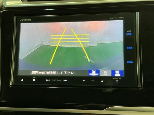 フィット １３Ｇ・Ｌパッケージ　ナビ　Ｒカメラ　ブルートゥース　フルセグ　盗難警報装置　Ｂカメ　Ｓキー　フルオートエアコン　整備記録簿　リモコンキー　横滑り防止機能　エアバック　アイスト　ＥＴＣ付き　パワーウィンド　Ｗエアバッグ（12枚目）