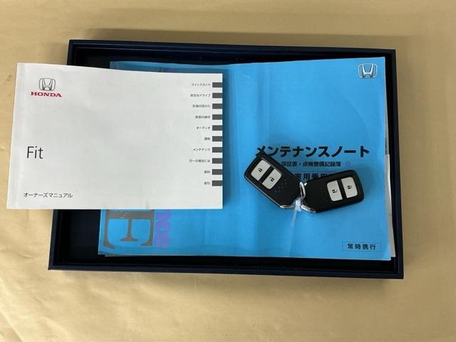 フィット １３Ｇ・Ｌパッケージ　ナビ　Ｒカメラ　ブルートゥース　フルセグ　盗難警報装置　Ｂカメ　Ｓキー　フルオートエアコン　整備記録簿　リモコンキー　横滑り防止機能　エアバック　アイスト　ＥＴＣ付き　パワーウィンド　Ｗエアバッグ（24枚目）