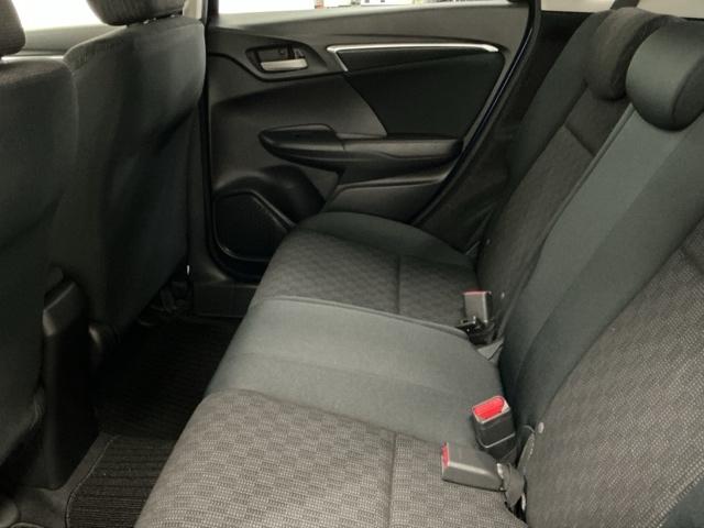 フィット １３Ｇ・Ｌパッケージ　ナビ　Ｒカメラ　ブルートゥース　フルセグ　盗難警報装置　Ｂカメ　Ｓキー　フルオートエアコン　整備記録簿　リモコンキー　横滑り防止機能　エアバック　アイスト　ＥＴＣ付き　パワーウィンド　Ｗエアバッグ（60枚目）