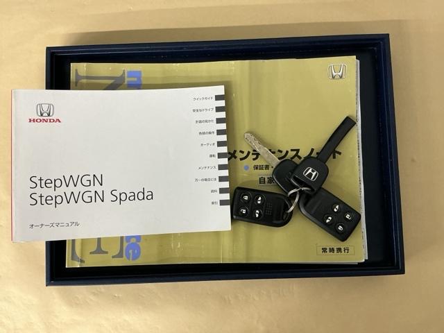 ステップワゴン GEセレクション ナビ Rカメラ ブルートゥース ワンセグTV 横滑防止装置 デュアルエアバッグ 三列シート キーレスエントリーキー ETC車載器 PW PS 盗難防止装置 記録簿 AAC リアカメラ 運転席エアバック(24枚目)