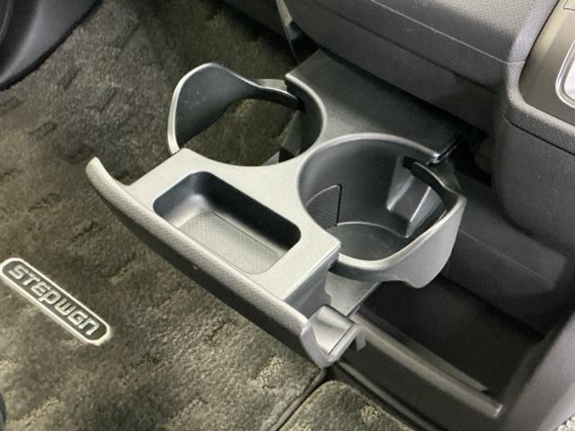 ステップワゴン GEセレクション ナビ Rカメラ ブルートゥース ワンセグTV 横滑防止装置 デュアルエアバッグ 三列シート キーレスエントリーキー ETC車載器 PW PS 盗難防止装置 記録簿 AAC リアカメラ 運転席エアバック(61枚目)