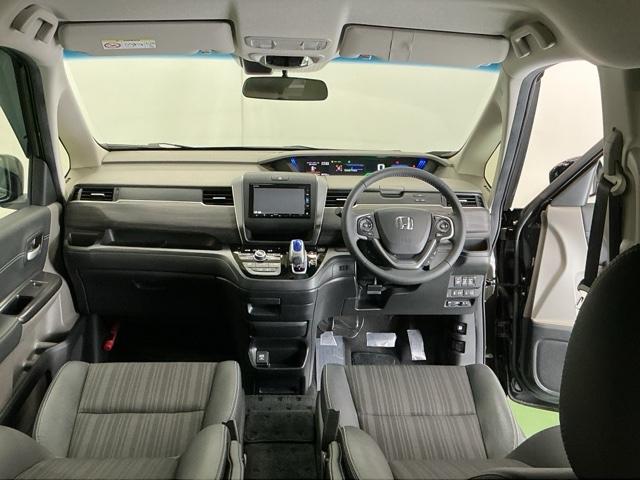 フリードハイブリッド ハイブリッド・ＥＸ　ナビ　Ｒカメラ　ブルートゥース　フルセグＴＶ　シ－トヒ－タ－　整備記録簿　リヤカメラ　ＬＥＤライト　フルオートエアコン　ＡＢＳ　ＤＶＤ再生可　ウォークスルー　サイドエアバッグ　キーフリー　ＥＴＣ車載器（2枚目）