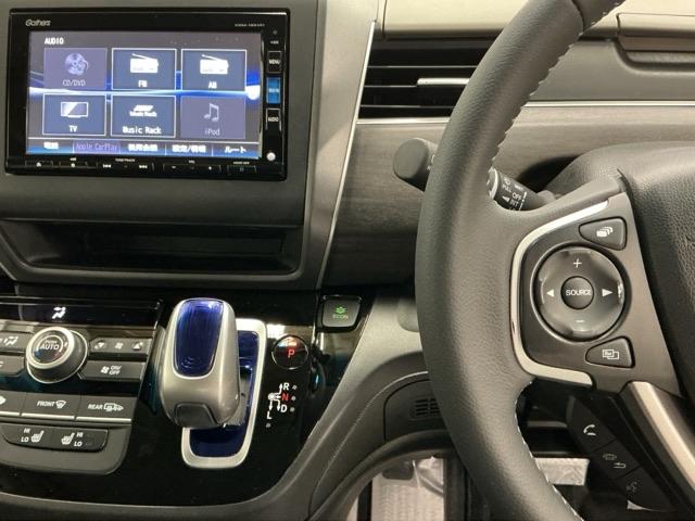 フリードハイブリッド ハイブリッド・ＥＸ　ナビ　Ｒカメラ　ブルートゥース　フルセグＴＶ　シ－トヒ－タ－　整備記録簿　リヤカメラ　ＬＥＤライト　フルオートエアコン　ＡＢＳ　ＤＶＤ再生可　ウォークスルー　サイドエアバッグ　キーフリー　ＥＴＣ車載器（3枚目）