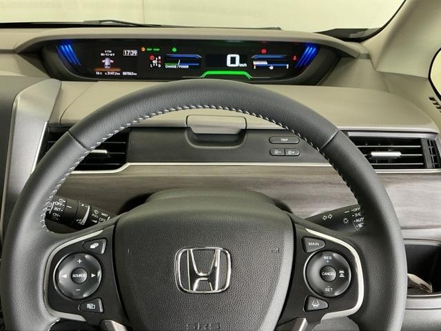 フリードハイブリッド ハイブリッド・ＥＸ　ナビ　Ｒカメラ　ブルートゥース　フルセグＴＶ　シ－トヒ－タ－　整備記録簿　リヤカメラ　ＬＥＤライト　フルオートエアコン　ＡＢＳ　ＤＶＤ再生可　ウォークスルー　サイドエアバッグ　キーフリー　ＥＴＣ車載器（20枚目）