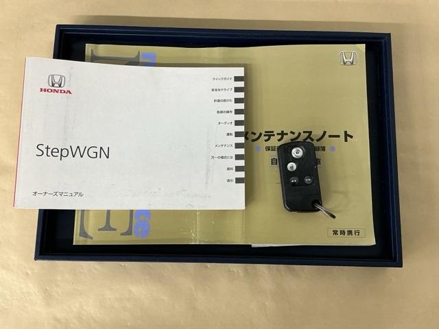 ステップワゴンスパーダ Ｚクールスピリット　ナビ　Ｒカメラ　後席モニター　ＤＶＤ　ＴＶ　キーフリー　横滑防止　記録簿付き　フルオートエアコン　パワーウインドウ　三列シート　運転席エアバック　パワステ　ワンセグ　ＡＢＳ　ＥＴＣ　スマートキ（26枚目）