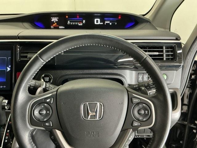 ステップワゴンスパーダ スパーダホンダセンシング　ドラレコ　ナビ　Ｒカメラ　後席モニター　盗難防止　助手席エアバッグ　Ｗパワスラ　記録簿有　地デジ　ＬＥＤライト　横滑り防止システム　オートエアコン　リアカメラ　ドライブレコーダー装着車　ＵＳＢ　スマ鍵（24枚目）