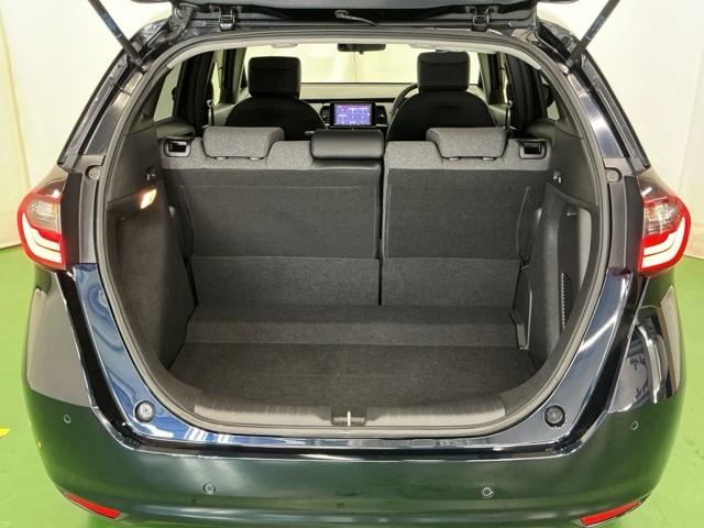 フィット ｅ：ＨＥＶホーム　ドラレコ　ナビ　Ｒカメラ　ブルートゥース　前後誤発進抑制機能　クリソナ　助手席エアバッグ　運転席エアバッグ　アイドリングストップ　ＬＥＤライト　ＵＳＢ接続　バックカメラ　ＡＢＳ　サイドエアバッグ（29枚目）