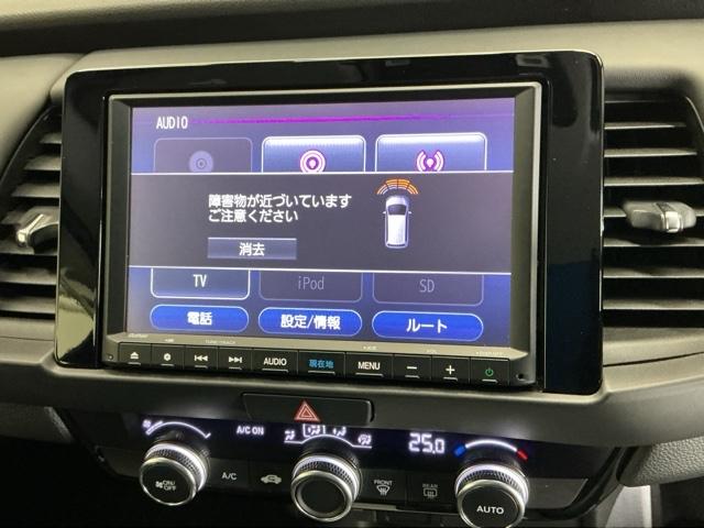 フィット ｅ：ＨＥＶホーム　ドラレコ　ナビ　Ｒカメラ　ブルートゥース　前後誤発進抑制機能　クリソナ　助手席エアバッグ　運転席エアバッグ　アイドリングストップ　ＬＥＤライト　ＵＳＢ接続　バックカメラ　ＡＢＳ　サイドエアバッグ（51枚目）