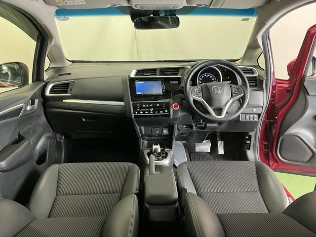 フィットハイブリッド Ｌホンダセンシング　ドラレコ　ナビ　Ｒカメラ　ブルートゥース　軽減ブレーキ　ＬＥＤ　サイドＳＲＳ　横滑り防止　ドライブレコーダー　フルセグテレビ　記録簿　パワーステアリング　盗難防止装置　オートクルーズ　ＥＴＣ車載器（2枚目）