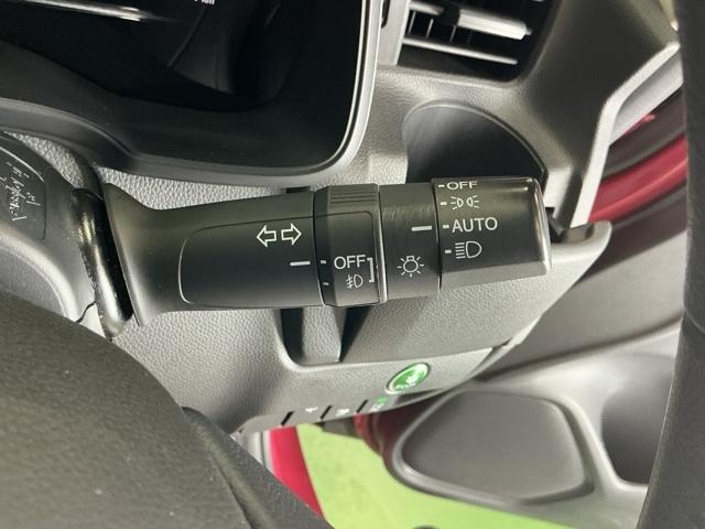 フィットハイブリッド Ｌホンダセンシング　ドラレコ　ナビ　Ｒカメラ　ブルートゥース　軽減ブレーキ　ＬＥＤ　サイドＳＲＳ　横滑り防止　ドライブレコーダー　フルセグテレビ　記録簿　パワーステアリング　盗難防止装置　オートクルーズ　ＥＴＣ車載器（22枚目）