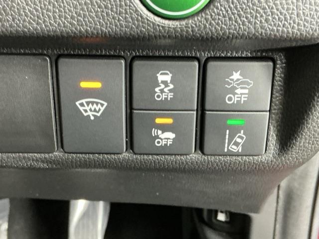 フィットハイブリッド Ｌホンダセンシング　ドラレコ　ナビ　Ｒカメラ　ブルートゥース　軽減ブレーキ　ＬＥＤ　サイドＳＲＳ　横滑り防止　ドライブレコーダー　フルセグテレビ　記録簿　パワーステアリング　盗難防止装置　オートクルーズ　ＥＴＣ車載器（26枚目）