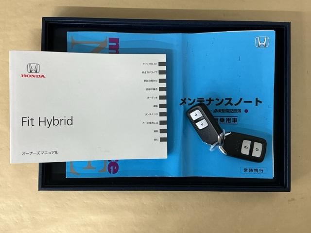 フィットハイブリッド Ｌホンダセンシング　ドラレコ　ナビ　Ｒカメラ　ブルートゥース　軽減ブレーキ　ＬＥＤ　サイドＳＲＳ　横滑り防止　ドライブレコーダー　フルセグテレビ　記録簿　パワーステアリング　盗難防止装置　オートクルーズ　ＥＴＣ車載器（29枚目）