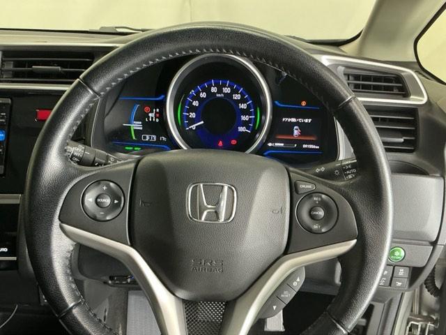 フィットハイブリッド Ｌパッケージ　ナビ　Ｒカメラ　ブルートゥース　フルセグ　サイドエアバック　ＤＶＤ再生　ＬＥＤ　ＥＣＯＮ　バックカメラ　オートクルーズコントロール　イモビライザー　ＥＴＣ　ＥＳＣ　ＡＵＴＯエアコン　ＡＢＳ　キーフリー（19枚目）