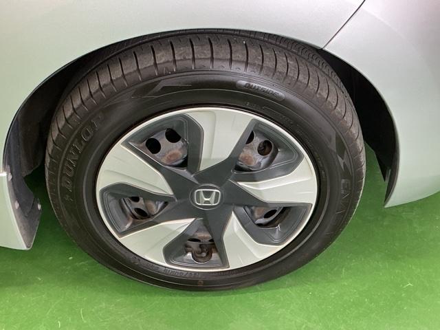 フィットハイブリッド Ｌパッケージ　ナビ　Ｒカメラ　ブルートゥース　フルセグ　サイドエアバック　ＤＶＤ再生　ＬＥＤ　ＥＣＯＮ　バックカメラ　オートクルーズコントロール　イモビライザー　ＥＴＣ　ＥＳＣ　ＡＵＴＯエアコン　ＡＢＳ　キーフリー（28枚目）