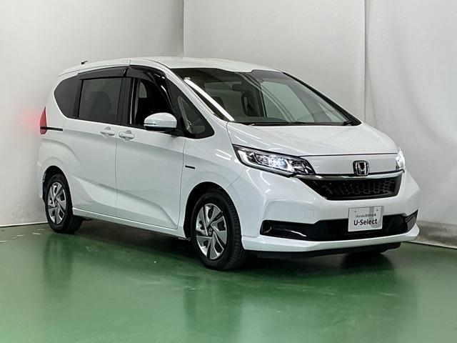 フリードハイブリッド ハイブリッド・Ｇホンダセンシング　ドラレコ　ナビ　Ｒカメラ　ブルートゥース　クルーズＣ　ＤＶＤ視聴　ＵＳＢ接続　ブレーキサポート　ＬＥＤヘットライト　Ｗエアバック　記録簿付き　バックモニタ　アイストップ　地デジフルセグ　キーレス　３列（7枚目）