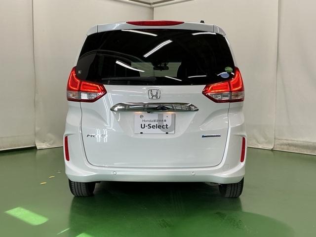 フリードハイブリッド ハイブリッド・Ｇホンダセンシング　ドラレコ　ナビ　Ｒカメラ　ブルートゥース　クルーズＣ　ＤＶＤ視聴　ＵＳＢ接続　ブレーキサポート　ＬＥＤヘットライト　Ｗエアバック　記録簿付き　バックモニタ　アイストップ　地デジフルセグ　キーレス　３列（9枚目）