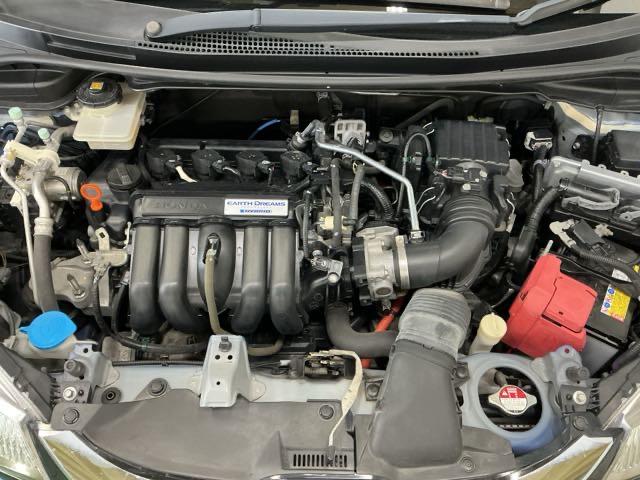 フィットハイブリッド Lパッケージ ナビ Rカメラ ブルートゥース フルセグ 横滑防止 カーテンエアバック DVD視聴 ETC車載器 ECOモード 助手席エアバック クルーズコントロール LEDヘッドライト エアコン エアバック(26枚目)