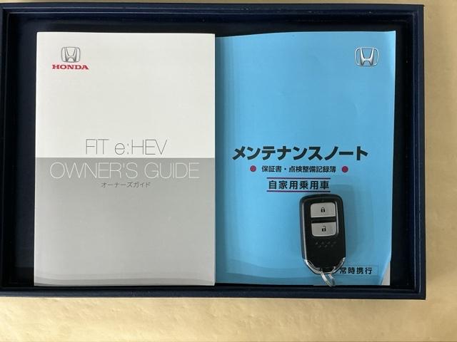 フィット e:HEVホーム ドラレコ ナビ Rカメラ ブルートゥース コーナーセンサ Bモニ ETC搭載 カーテンエアバッグ イモビライザー 記録簿付 ECON AUTOライト LEDヘッドランプ USB スマートキ エアバック(30枚目)