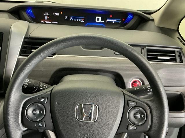 フリード Ｇブラックスタイル　ドラレコ　ナビ　Ｒカメラ　ブルートゥース　シートヒータ　三列シート　イモビ　横滑り防止　両電動スライドドア　記録簿　リアカメラ　オートエアコン　クルコン　フルセグテレビ　キーフリー　スマートキー（22枚目）