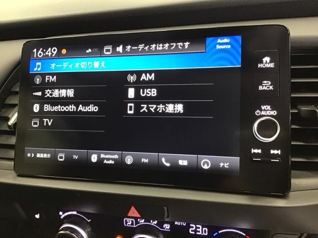 フィット ｅ：ＨＥＶホーム２０周年特別仕様車カーサ　ドラレコ　ナビ　Ｒカメラ　ブルートゥース　ＬＥＤライト　フルセグ　オートライト　シートヒータ　ＥＴＣ車載器　オートクルーズコントロール　サイドＳＲＳ　スマートキー　イモビライザー　オートエアコン（11枚目）