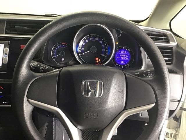 フィット １３Ｇ・Ｌパッケージ　ナビ　ＥＴＣ　ＣＤ　運転席エアバッグ　盗難防止システム　整備記録簿　エコアイドリングストップ　キーレス　ＷＡＢ　ＬＥＤヘッド　スマ－トキ－　ＶＳＡ　パワーウィンド　ＡＵＴＯエアコン　ＡＢＳ（17枚目）