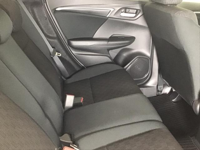 フィット １３Ｇ・Ｌパッケージ　ナビ　ＥＴＣ　ＣＤ　運転席エアバッグ　盗難防止システム　整備記録簿　エコアイドリングストップ　キーレス　ＷＡＢ　ＬＥＤヘッド　スマ－トキ－　ＶＳＡ　パワーウィンド　ＡＵＴＯエアコン　ＡＢＳ（63枚目）