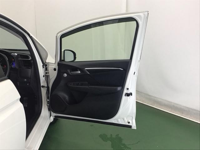 フィット １３Ｇ・Ｌパッケージ　ナビ　ＥＴＣ　ＣＤ　運転席エアバッグ　盗難防止システム　整備記録簿　エコアイドリングストップ　キーレス　ＷＡＢ　ＬＥＤヘッド　スマ－トキ－　ＶＳＡ　パワーウィンド　ＡＵＴＯエアコン　ＡＢＳ（65枚目）