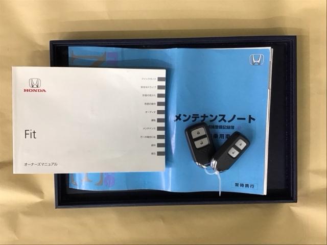 フィット １３Ｇ・Ｆパッケージ　ナビ　Ｒカメラ　ブルートゥース　ワンセグ　ＶＳＡ　記録簿付き　スマートキープッシュスタート　マニュアルエアコン　助手席エアバッグ　後カメラ　ＤＶＤ再生　ＥＴＣ装備　ＰＷ　ＡＢＳ　キーレス　ＰＳ　１セグ（24枚目）