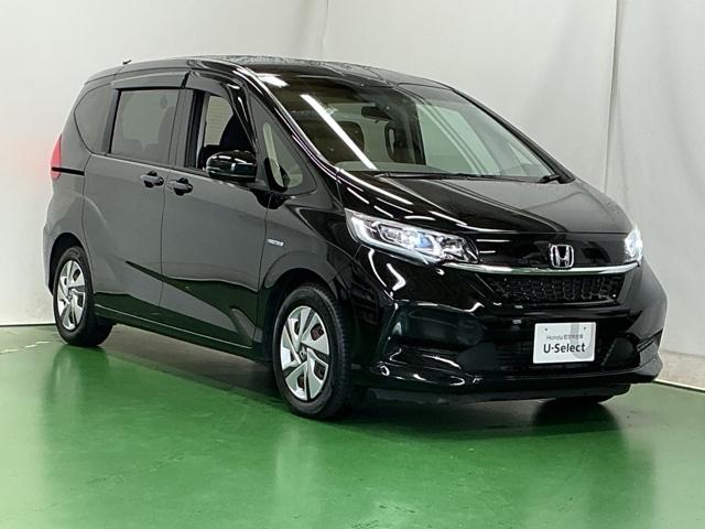 フリードハイブリッド ハイブリッド・Ｇホンダセンシング　ナビ　Ｒカメラ　後席モニター　フルセグ　軽減ブレーキ　キーフリーシステム　記録簿　ＤＶＤ再生可能　ＥＣＯＮ　後カメラ　Ａクルーズ　ＬＥＤヘッドランプ　シートＨ　横滑防止　ドライブレコーダ　３列シート（7枚目）
