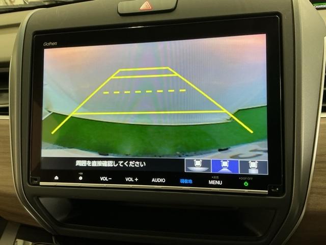 フリードハイブリッド ハイブリッド・Ｇホンダセンシング　ナビ　Ｒカメラ　後席モニター　フルセグ　軽減ブレーキ　キーフリーシステム　記録簿　ＤＶＤ再生可能　ＥＣＯＮ　後カメラ　Ａクルーズ　ＬＥＤヘッドランプ　シートＨ　横滑防止　ドライブレコーダ　３列シート（12枚目）
