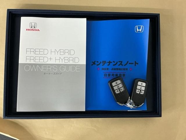 フリードハイブリッド ハイブリッド・Ｇホンダセンシング　ナビ　Ｒカメラ　後席モニター　フルセグ　軽減ブレーキ　キーフリーシステム　記録簿　ＤＶＤ再生可能　ＥＣＯＮ　後カメラ　Ａクルーズ　ＬＥＤヘッドランプ　シートＨ　横滑防止　ドライブレコーダ　３列シート（34枚目）