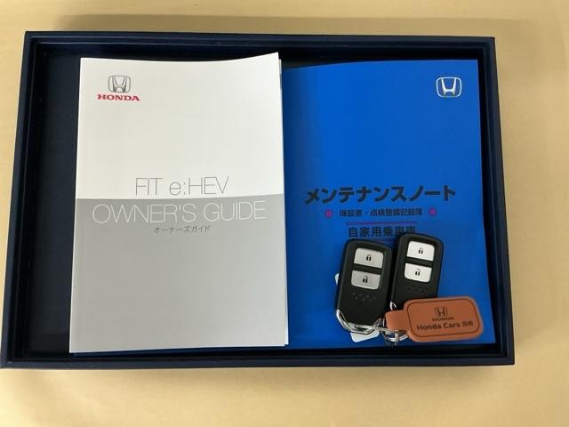 フィット ｅ：ＨＥＶホーム　ナビ　Ｒカメラ　ブルートゥース　フルセグ　前後誤発進抑制機能　クリソナ　助手席エアバッグ　運転席エアバッグ　アイドリングストップ　ＬＥＤライト　ＵＳＢ接続　バックカメラ　ＡＢＳ　サイドエアバッグ（28枚目）