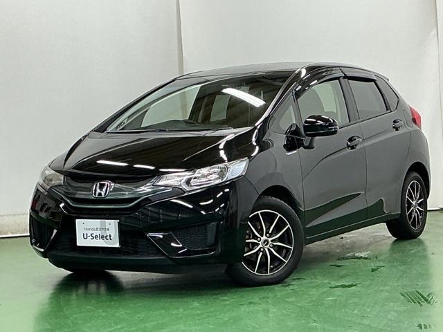 フィットハイブリッド Fパッケージ ナビ Rカメラ ブルートゥース TV CD 盗難警報装置 記録簿有り AUTOエアコン 助手席エアバック ECON ETC付き リヤカメラ ABS付 横滑り防止システム キーレスエントリー ワンセグ(10枚目)