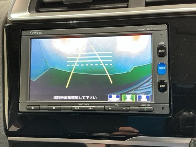 フィットハイブリッド Fパッケージ ナビ Rカメラ ブルートゥース TV CD 盗難警報装置 記録簿有り AUTOエアコン 助手席エアバック ECON ETC付き リヤカメラ ABS付 横滑り防止システム キーレスエントリー ワンセグ(12枚目)